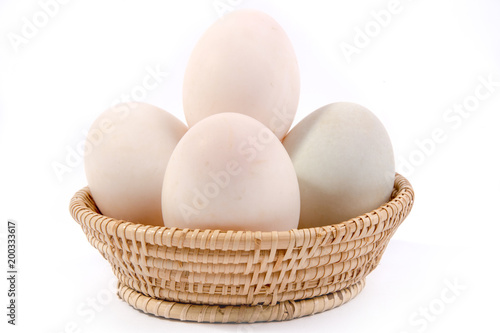 Wallpaper Mural Eggs in the basket Isolated on White Background Torontodigital.ca