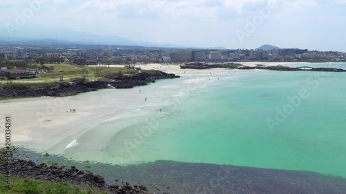 Wallpaper Mural fixed footage of Hamdeok Beach, view from Seoubong peak. It is one of the most famous beach in Jeju island , for clean and emerald-blue water and white sand. Torontodigital.ca