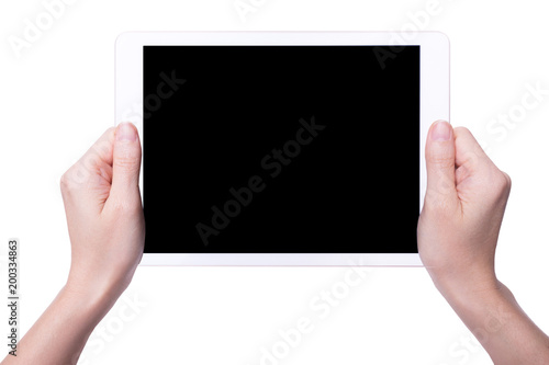 White tablet in woman's hands isolated on white in horizontal mode