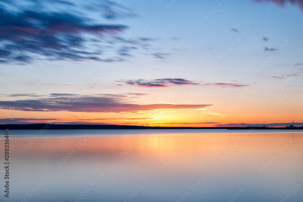 Dawn over the water. Horizon.