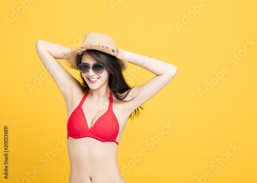happy young woman in swimsuit isolated