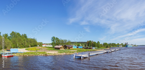 View of the piers on the river in the village