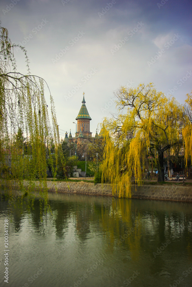Back view of the Orthodox Metropolitan Cathedral from the banks of Bega river in Timisoara, Timis County, Romania