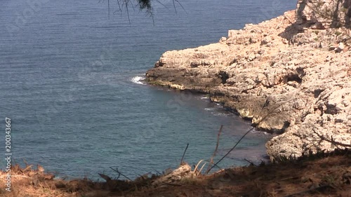 Spilling of waves of mediterranean sea on Crete, Greece. photo