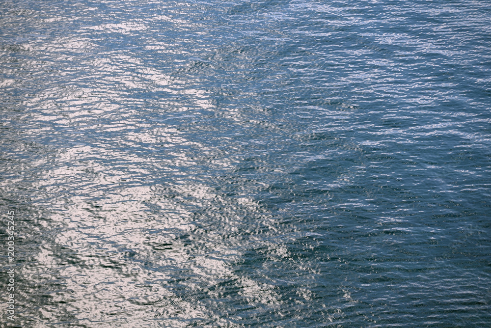 The surface of the water in the sea. Surface and small waves in the sea