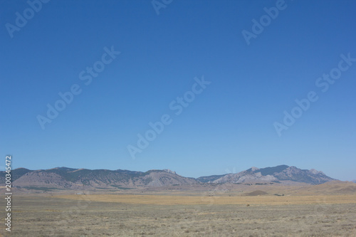 A view of the mountains and the deserted steppe in the summer.