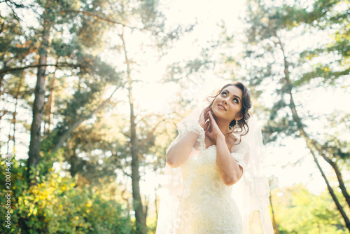Beautiful bride outdoors in a forest