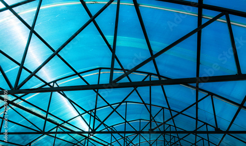 Blue glass roof. Glass architecture. Abstract blue background. Indoor pavilion. Modern architecture