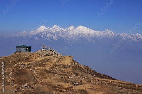 Ganesh Himal mountain range seen from Laurebina, Nepal. Fogy spring day in the Himalayas. photo