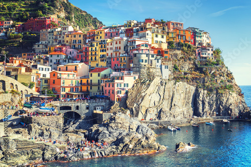 Scenic view of Manarola village and the sea in the province Liguria, Cinque Terre, northern Italy on a clear sunny day
