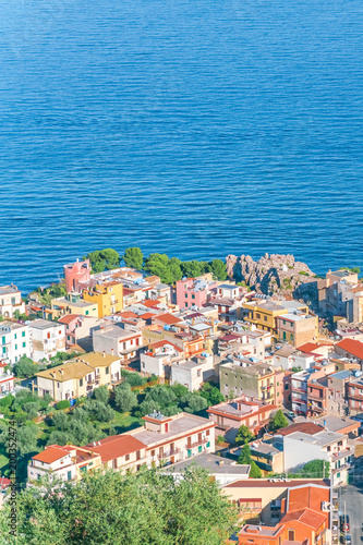 The sea at Porticello near Bagheria, with houses at the coastline