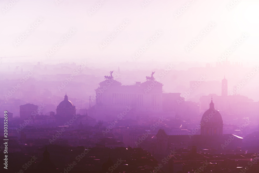 Rome rooftop view at sunrise silhouette with ancient architecture in Italy