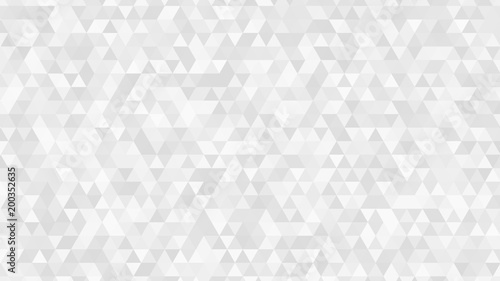Abstract light background of small triangles in white and gray colors.
