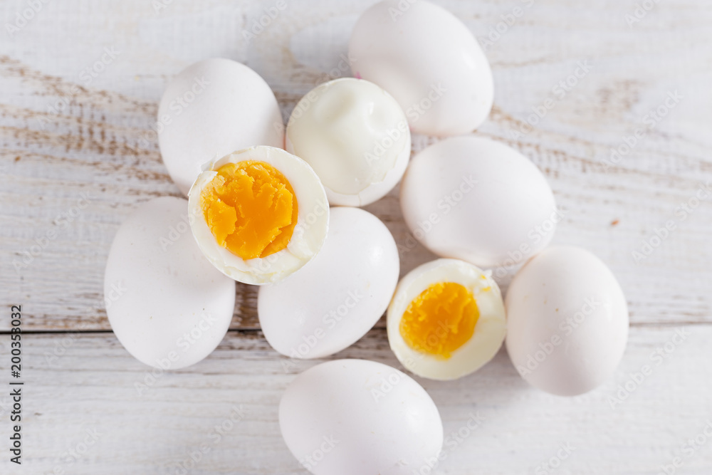 White eggson the white wood background White eggson the white wood background