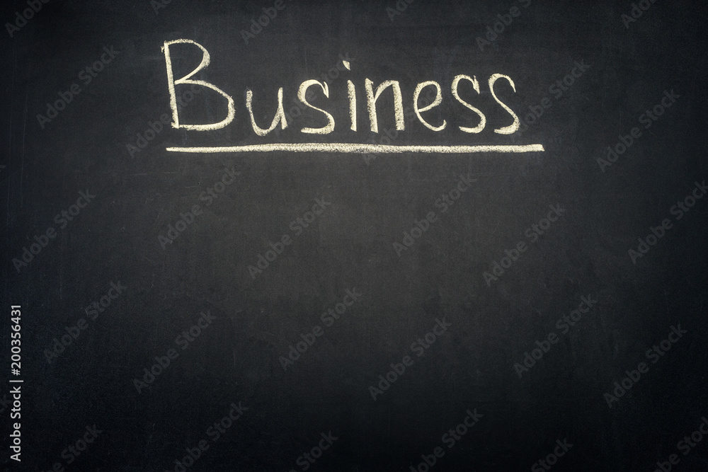 Obraz premium Business underlined inscription on dark chalkboard