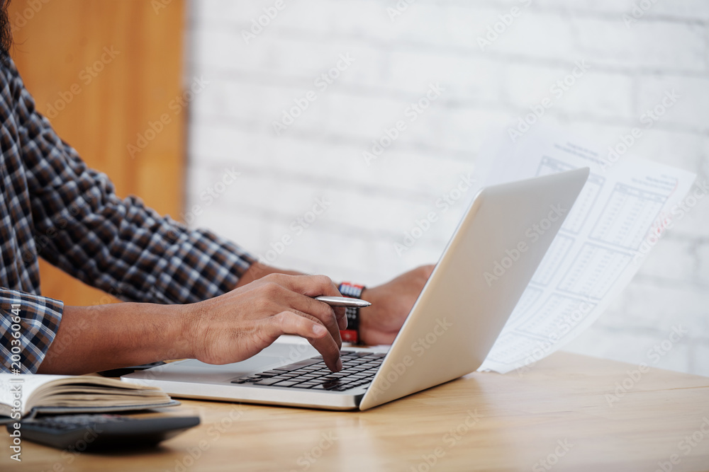 Fototapeta premium Working on financial report