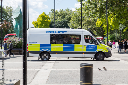 Metropolitan Police van with police officer inside at Marble Arch, London photo