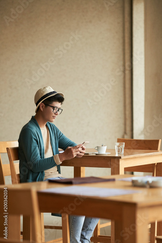 Man resting in cafe