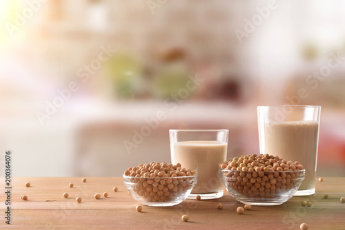 Reptientes with soy milk and grains in rustic kitchen front
