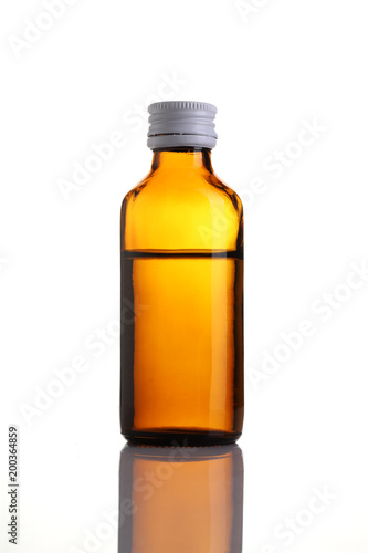 Brown Glass Bottle of Medicine Syrup isolated on white