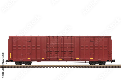 Railroad Box Car / A maroon railway box car on track.