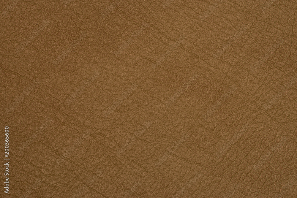 Light brown leather texture surface. Close-up of natural grain cow leather Light brown leather texture surface. Background Light brown leather texture surface. Close-up of natural grain cow leather Light brown leather texture surface. Background