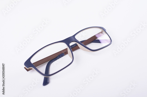 Blue eye glasses on white background. Isolated.