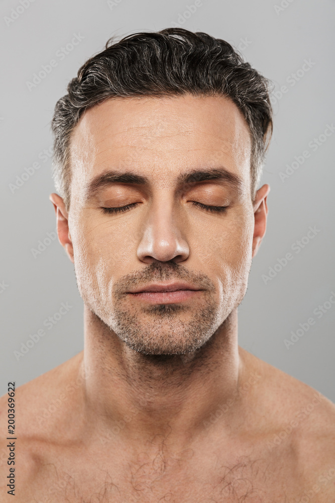 Handsome concentrated mature man. Eyes closed. Handsome concentrated mature man. Eyes closed.