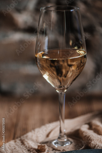 close-up view of glass of white wine, selective focus