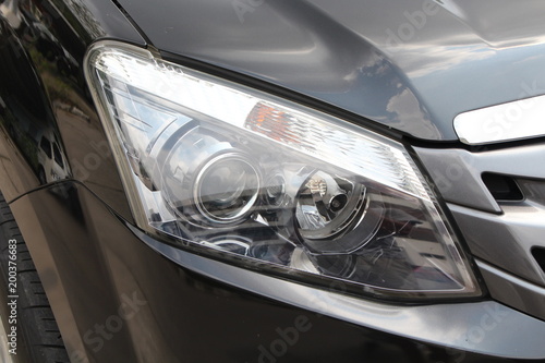 Car's headlight details © Sista