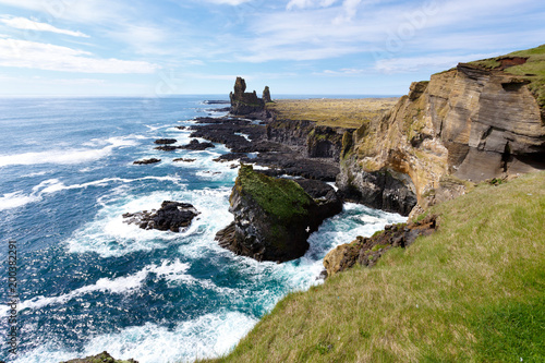 Snaefellsnes peninsula, Island, Lóndrangar basalt cliffs near Malarrifsviti lighthouse photo
