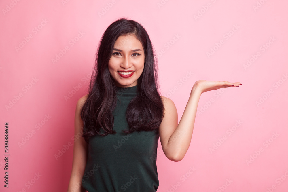 Beautiful young Asian woman show palm hand. Beautiful young Asian woman show palm hand.