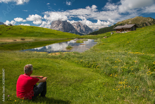 Man is relaxing in the Dolomites