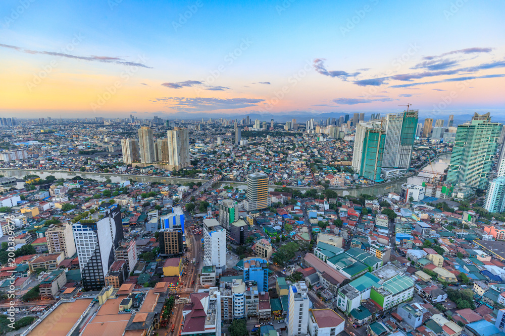 Manila Skyline. Night view of Makati, the business district of Metro Manila - obrazy, fototapety, plakaty 