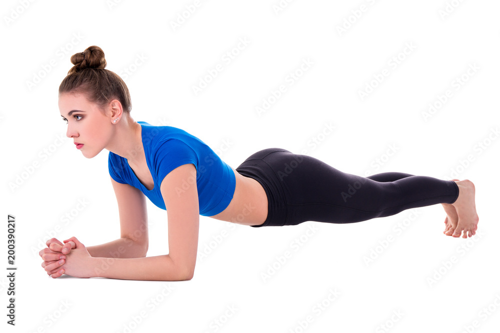 young beautiful woman doing push up exercise isolated on white young beautiful woman doing push up exercise isolated on white
