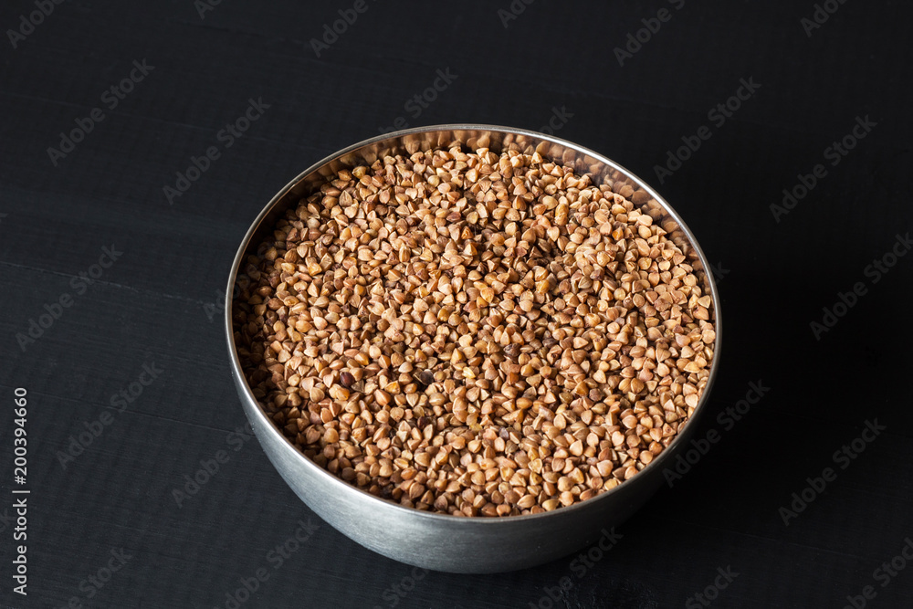 roasted buckwheat in metal bowl roasted buckwheat in metal bowl