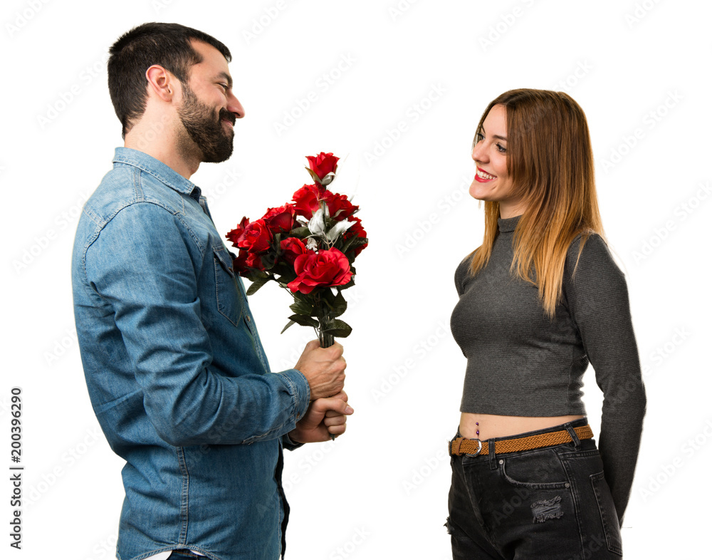 Man and woman holding flowers Man and woman holding flowers