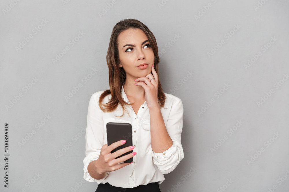 Portrait of a pensive young business woman Portrait of a pensive young business woman