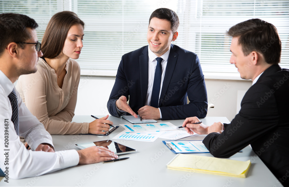 Business people working together in the office Business people working together in the office