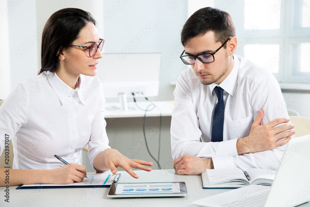 Business people working together in the office Business people working together in the office