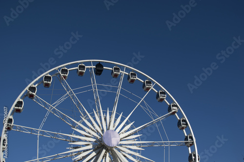 Ferris Wheel With blue sky background