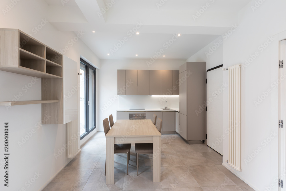 Fototapeta premium Front view of modern kitchen