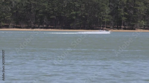 Georgia, Lake Alatoona, A speed boat zooming across Lake Alatoona photo