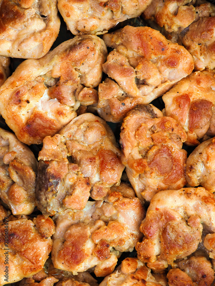 Pieces of roasted meat vertical background. Top view. Grill, lunch and dinner, culinary or food background. Set of chicken meat barbecue roasted seasoned, close-up, macro Pieces of roasted meat vertical background. Top view. Grill, lunch and dinner, culinary or food background. Set of chicken meat barbecue roasted seasoned, close-up, macro
