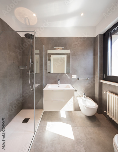 Modern bathroom with large tiles photo