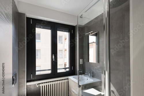 Modern bathroom with large tiles