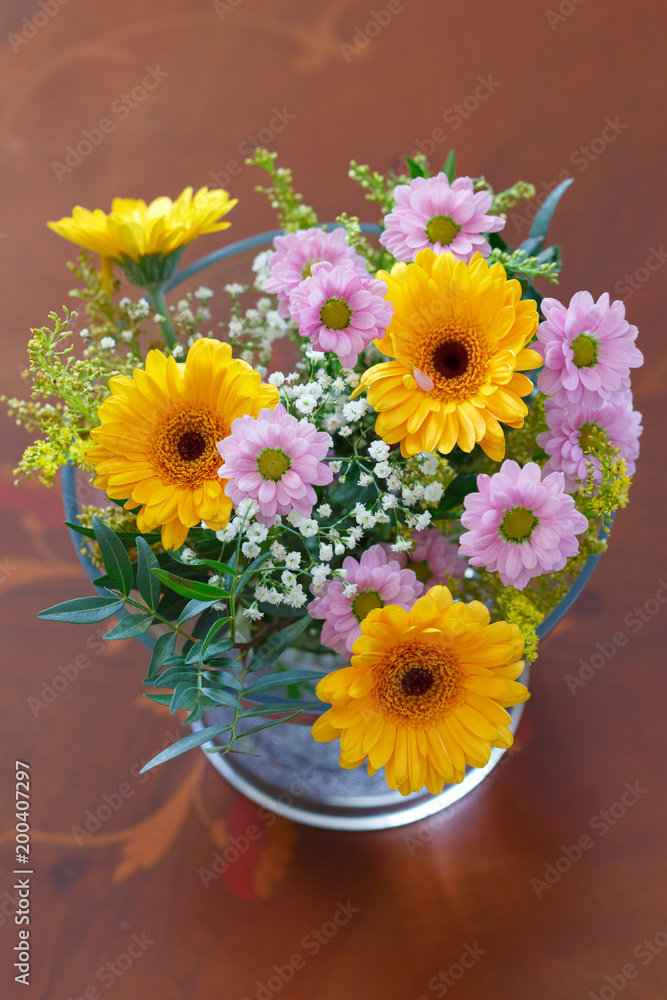 Flower arrangement of yellow Gerbera's