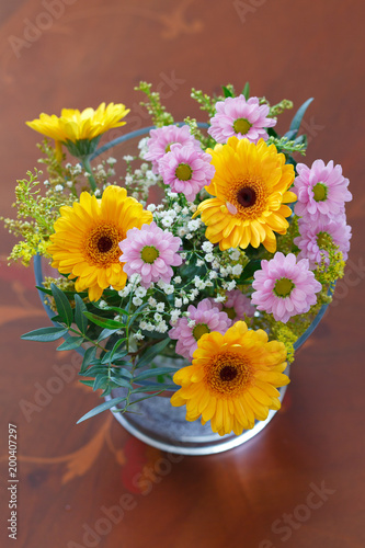 Flower arrangement of yellow Gerbera's
