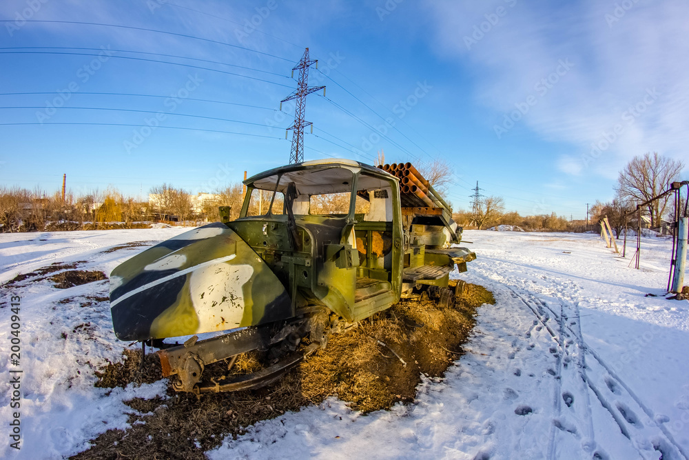 Ukraine, Lugansk - 25 february 2018: Broken military equipment after the fighting near the city of Lugansk Ukraine, Lugansk - 25 february 2018: Broken military equipment after the fighting near the city of Lugansk
