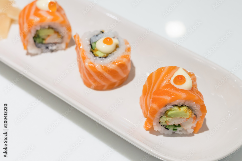 roll sushi with salmon In white plate